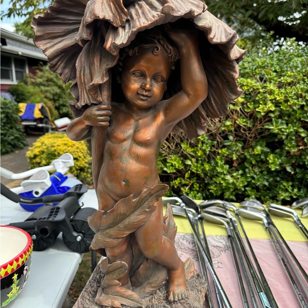 Vintage decorative cast resin statue cherub child statue nature figural art.